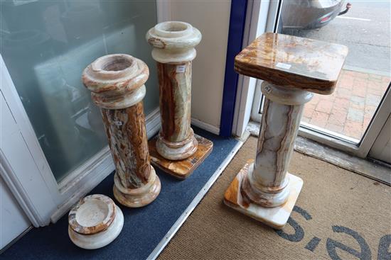 Two pairs of onyx pedestals (4), not all complete H.73.5cm